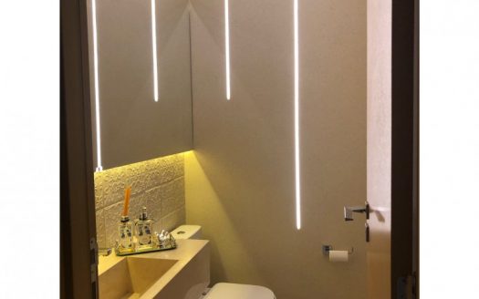 Apartment with architectural and luminotechnical designs