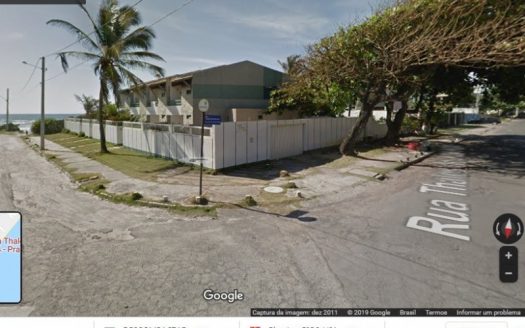 Land with house by the sea