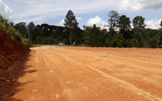 Land facing the highway in commercial area