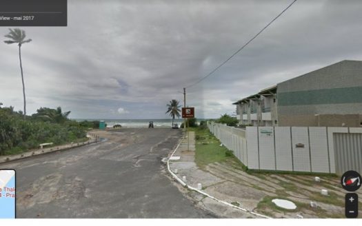Land with house by the sea
