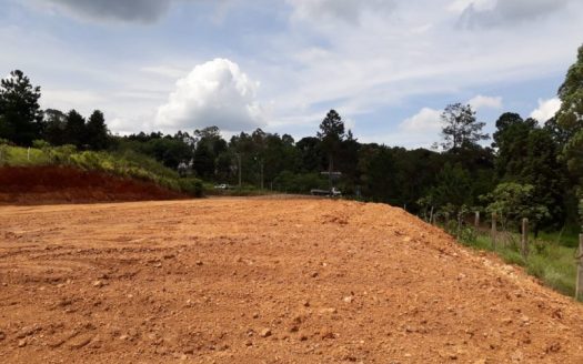 Land facing the highway in commercial area