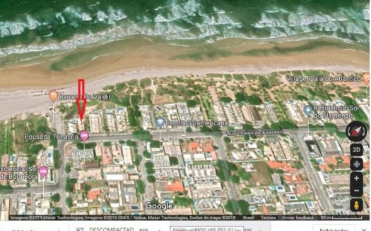 Land with house by the sea