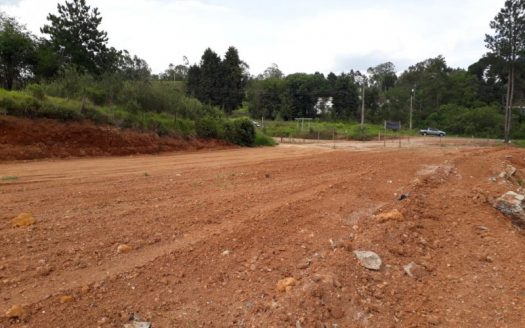 Land facing the highway in commercial area
